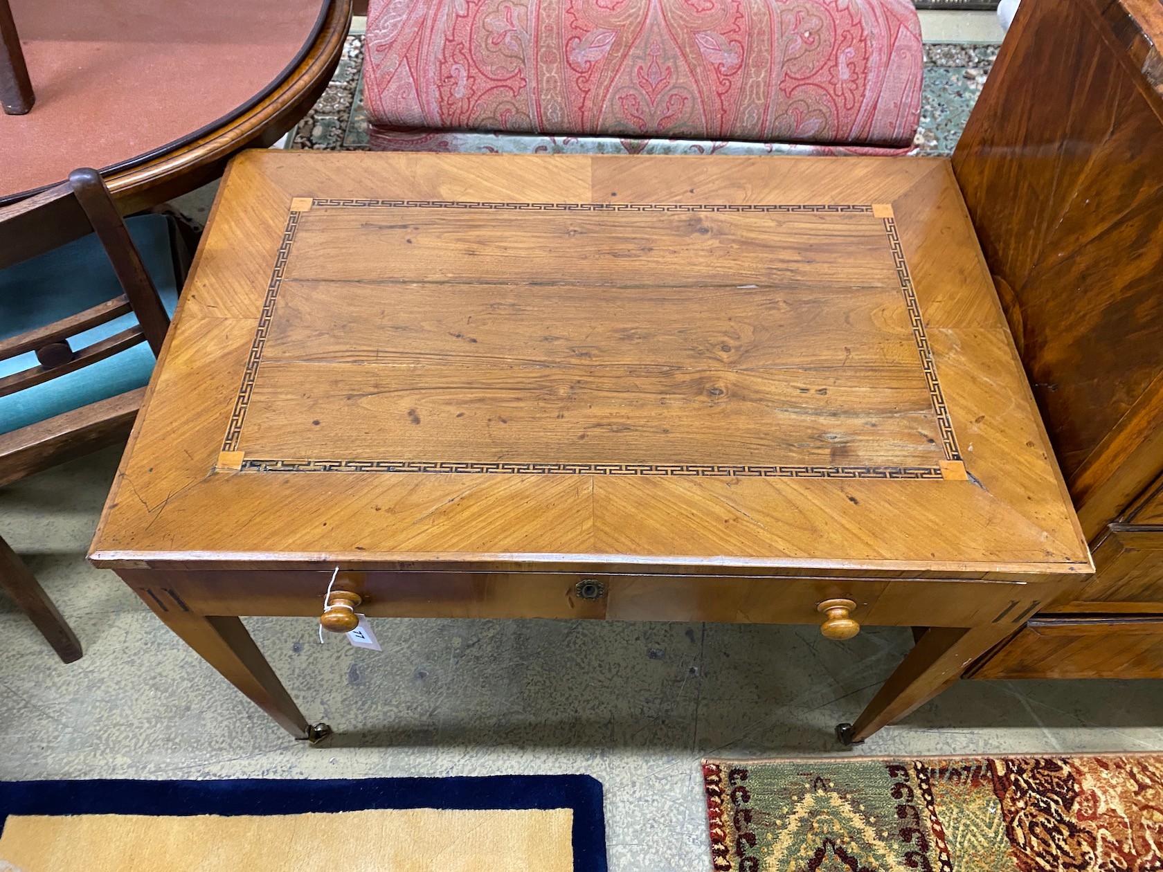 An early 19th century Dutch inlaid walnut side table, width 94cm, depth 60cm, height 70cm